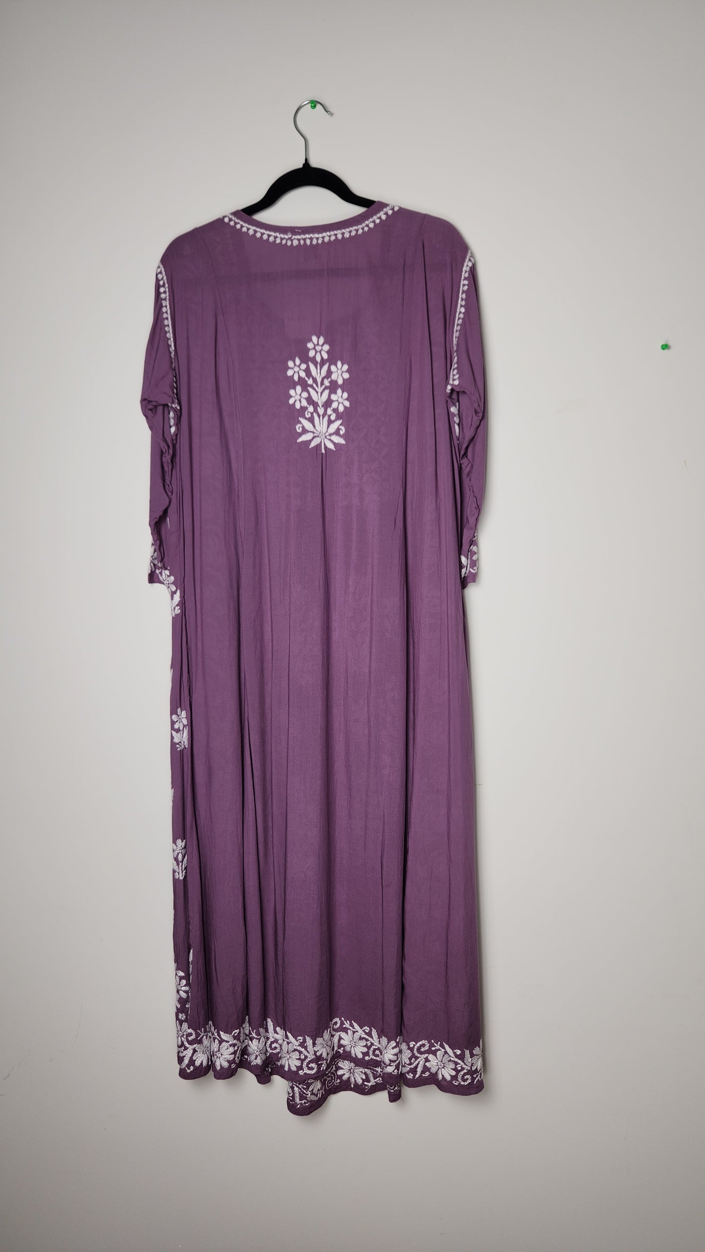 Purple dress with floral lace details on a plain background. Shop the world’s first best collection of elegant kurtis, beautiful maxi dresses, and premium cordsets—affordable, stylish, and crafted for boutique lovers in Auckland, New Zealand, and Australia. Premium quality meets cheap prices in fashion that’s both modest and stunning.