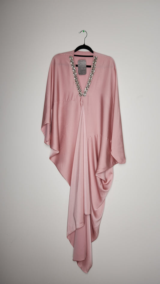 Pink dress on a hanger against a plain background.  Best-selling kurti design, perfect for Australia’s summer events.