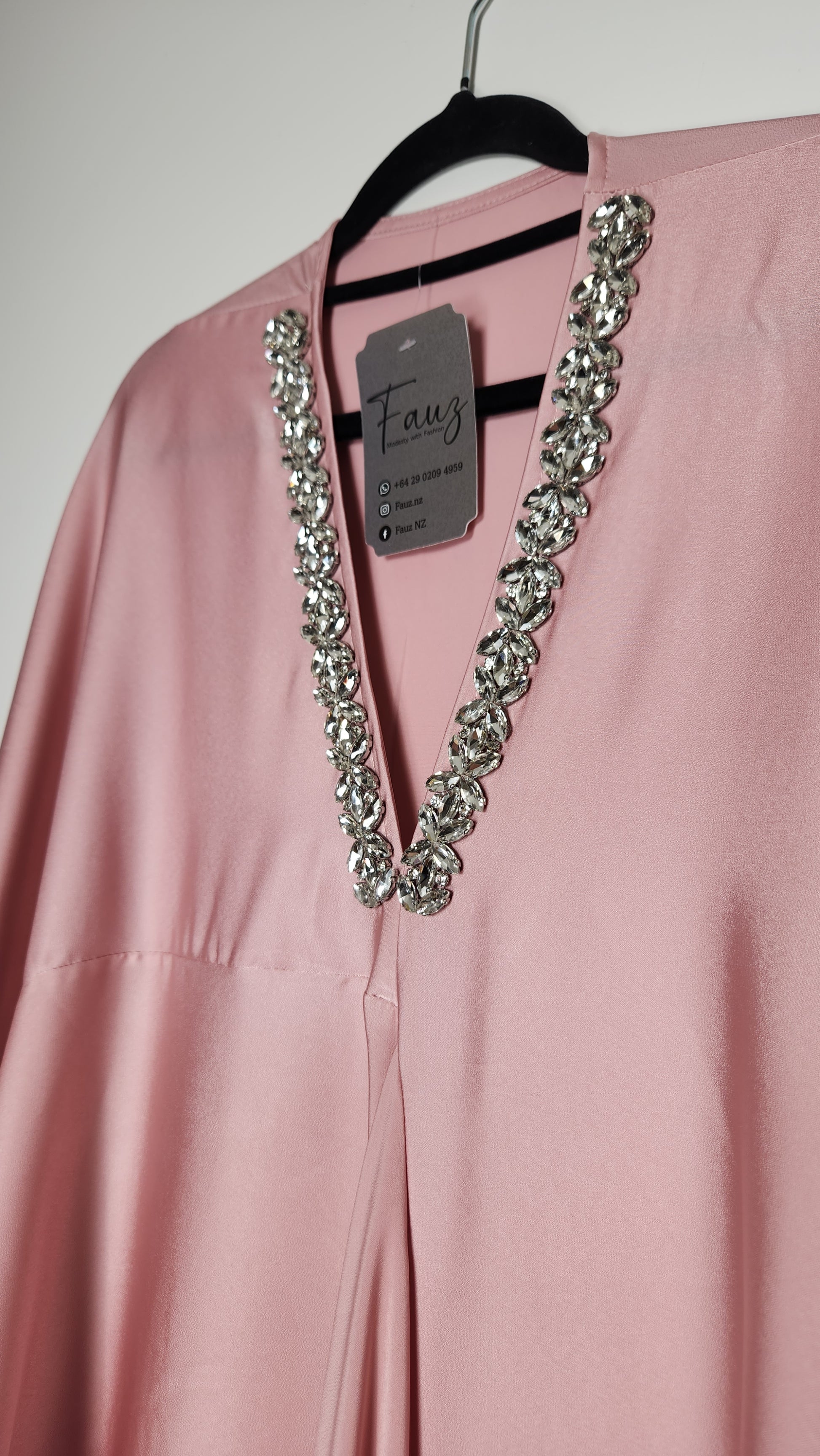 Close-up of a pink garment with a decorative chain on a plain background. - Beautiful maxi dress with lace detailing—affordable luxury from New Zealand.
- Best-selling kurti design, perfect for Australia’s summer events.
- Premium quality cordset in soft satin, styled with modest flair.
- Affordable maxi dress with floral embroidery, ideal for Auckland brunches.
- World’s first best cordset in pastel tones—crafted for boutique lovers.
- Elegant kurti with gold accents, designed for New Zealand’s modern woma