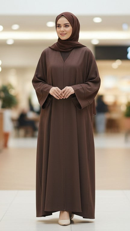 A38 elegant abaya burkha in brown, featuring a slit design and stylish overlock stitching, perfect for modest women’s fashion in NZ, Australia & Fiji.